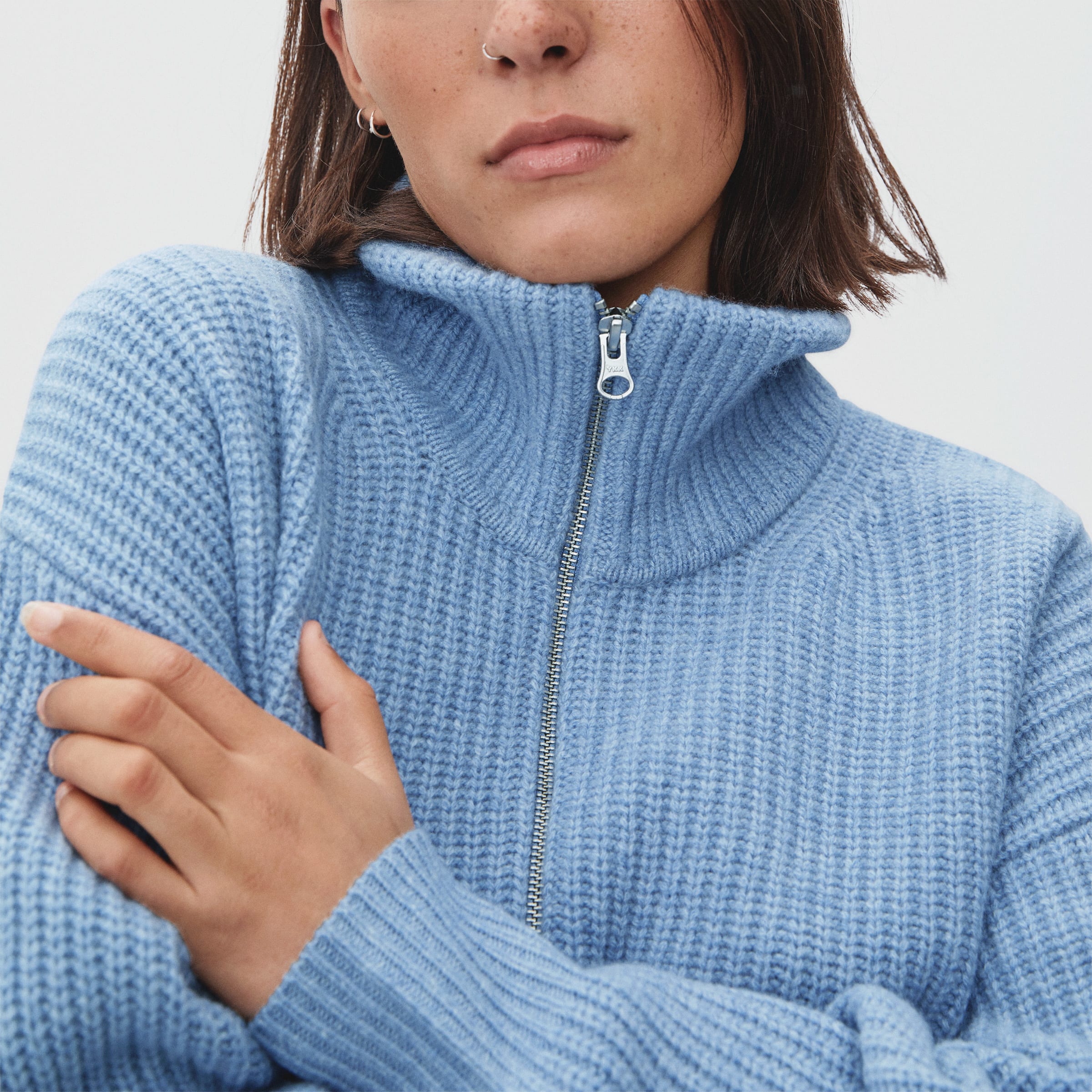 blue half zip sweater
