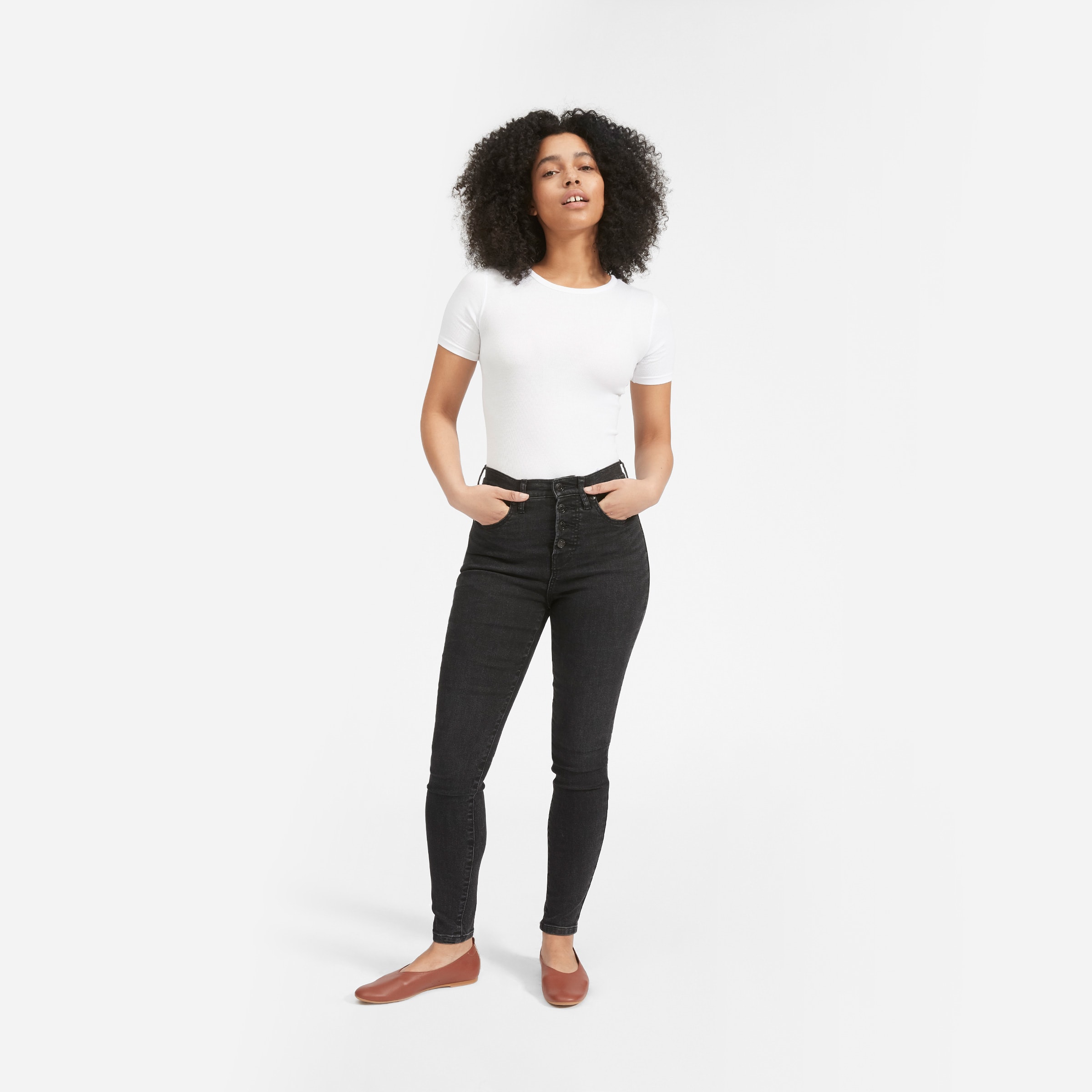 black button fly skinny jeans