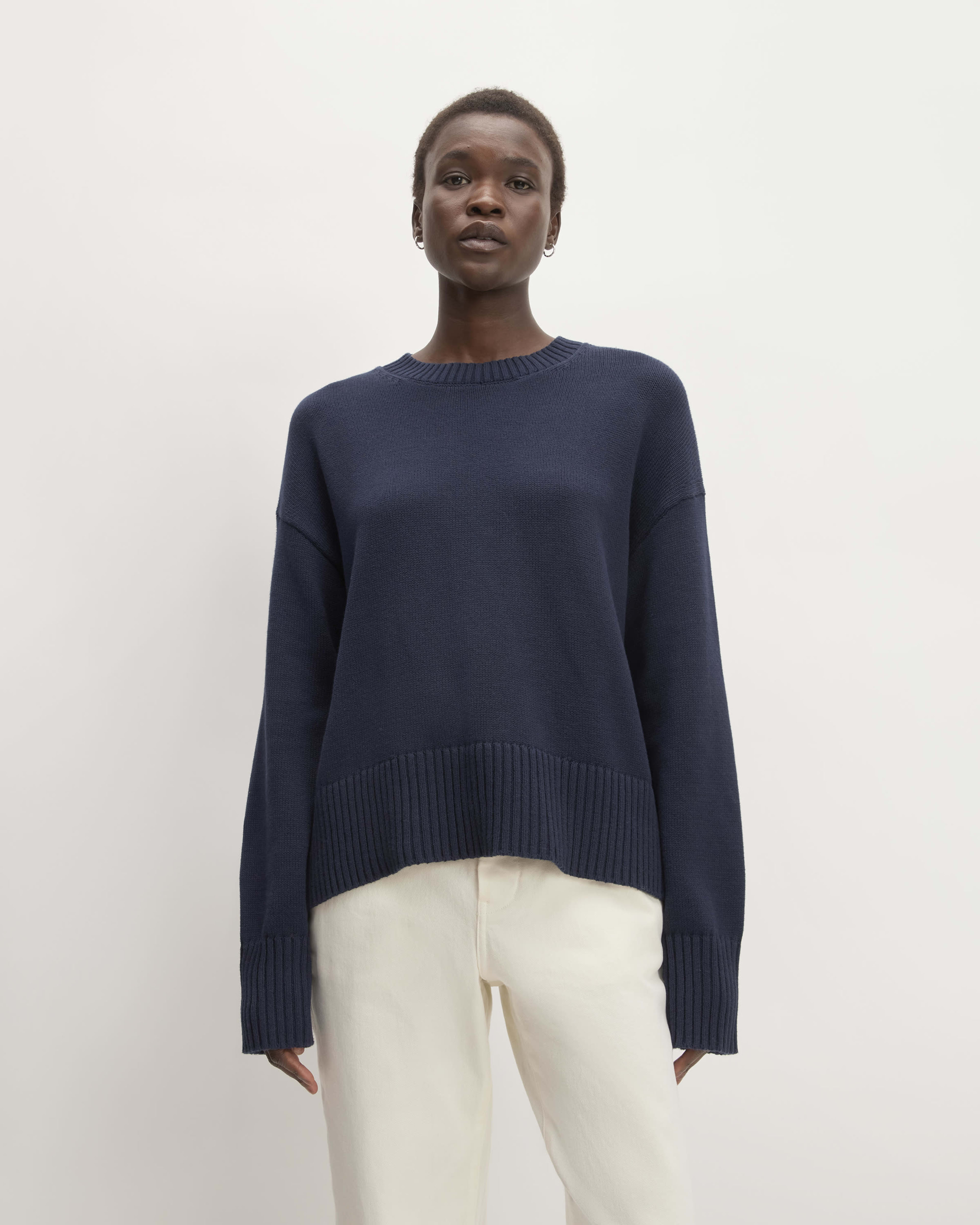 Crew neck jumper with shirt outlet