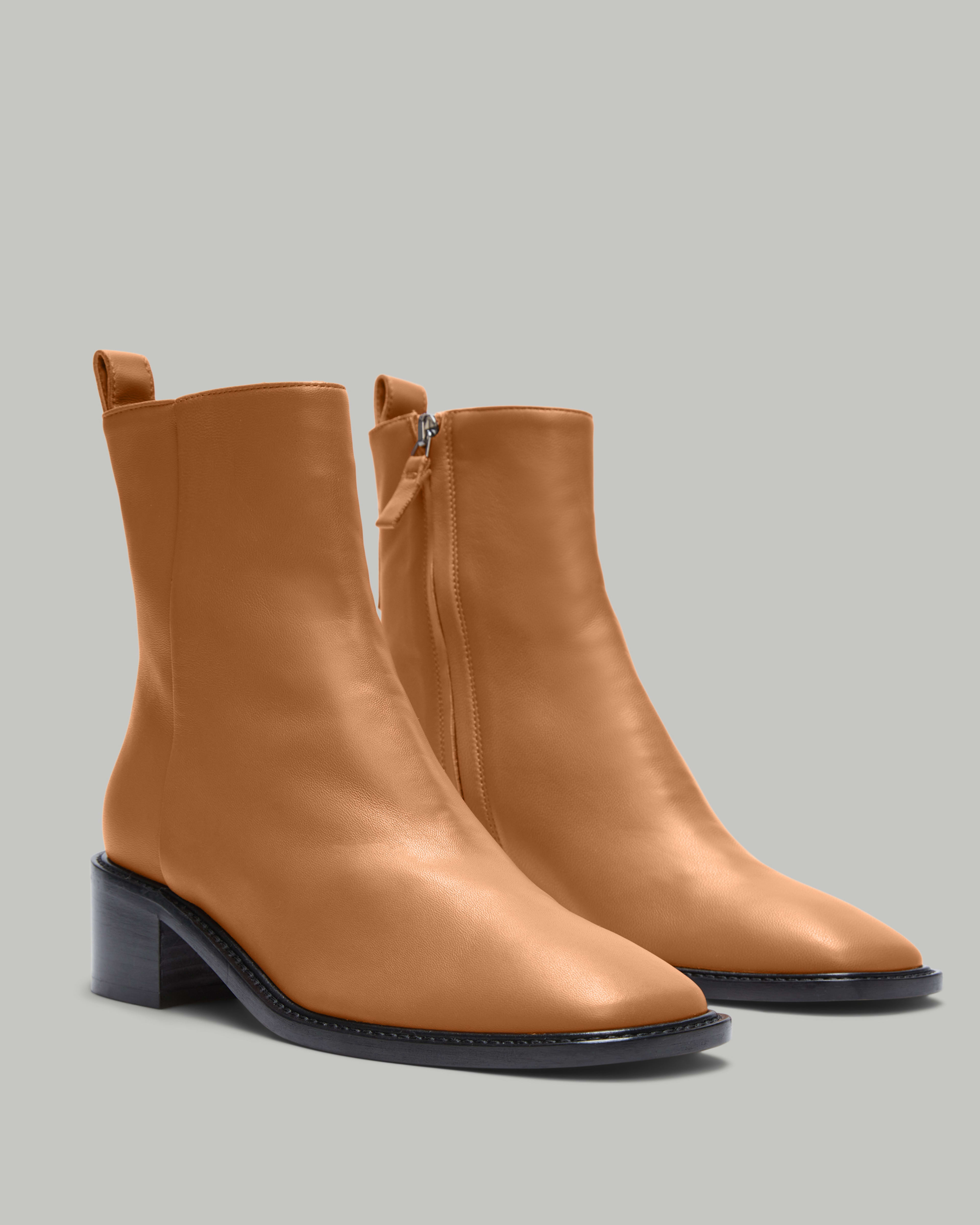 Everlane  Introducing The City Boot: timeless details, round-the