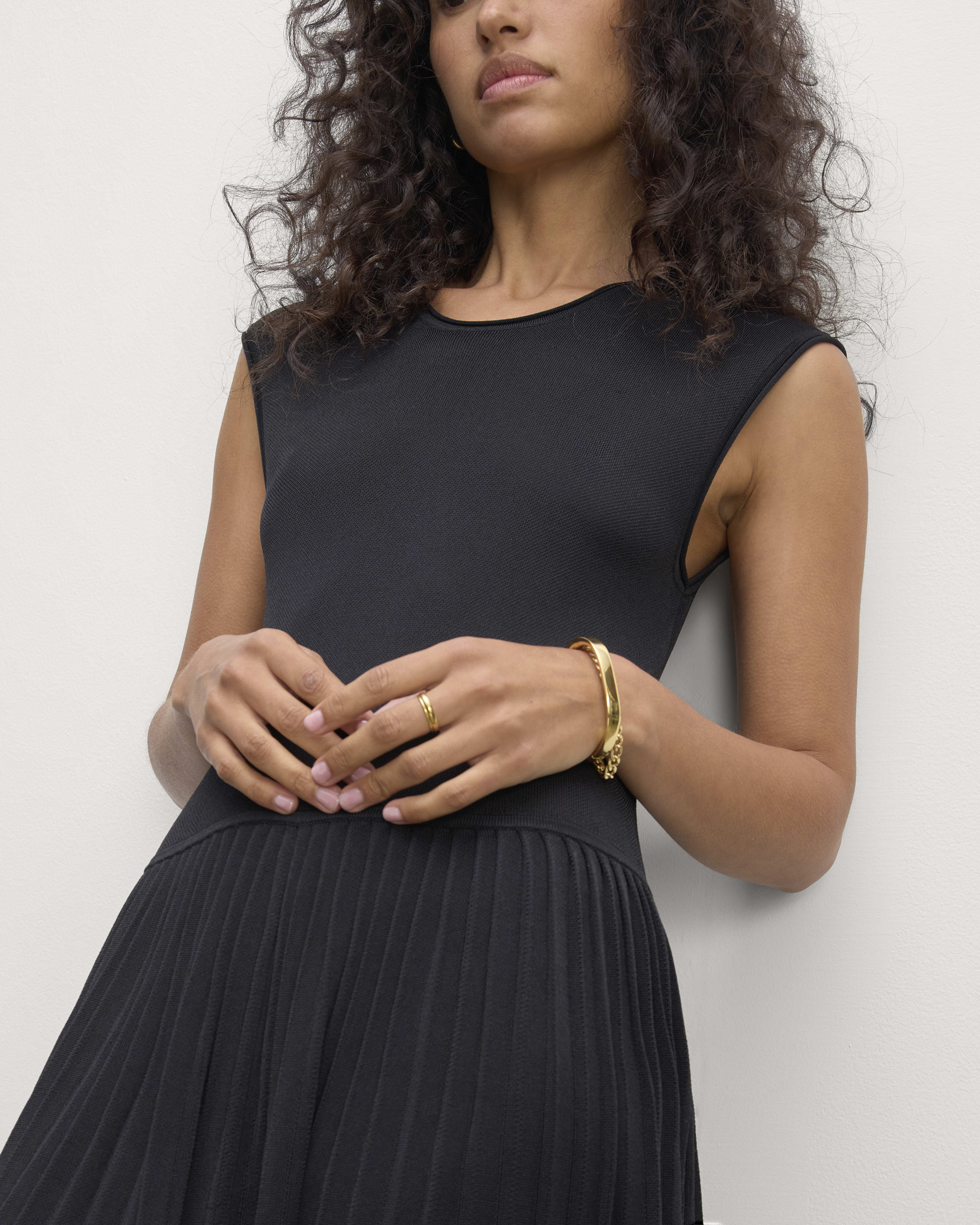 Ribbed Knit Pleated black dress with Asymmetrical Neckline main image 0
